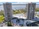 Wonderful aerial view featuring waterfront condos, community pool, and manicured landscaping at 1 Oceans West Blvd # 20B4, Daytona Beach, FL 32118
