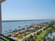 Beautiful aerial view of waterfront homes and a golf course alongside a large bay at 1 Oceans West Blvd # 20B4, Daytona Beach, FL 32118