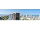 Expansive aerial view featuring waterfront condos, landscaping, and a community pool at 1 Oceans West Blvd # 20B4, Daytona Beach, FL 32118