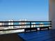 Breathtaking balcony view showcasing the ocean and neighboring high-rise buildings at 1 Oceans West Blvd # 20B4, Daytona Beach, FL 32118