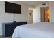 Comfortable bedroom with a dresser and closet space at 1 Oceans West Blvd # 20B4, Daytona Beach, FL 32118