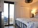 Bright bedroom with a balcony and plenty of storage at 1 Oceans West Blvd # 20B4, Daytona Beach, FL 32118