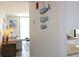 Cozy living room featuring modern decor and seamless access to the updated kitchen space at 1 Oceans West Blvd # 20B4, Daytona Beach, FL 32118