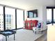 Open living area with lots of natural light, large windows, and decorative accents at 1 Oceans West Blvd # 20B4, Daytona Beach, FL 32118