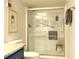 Modern shower with glass doors and chrome fixtures, complemented by bathroom accessories at 1 Oceans West Blvd # 20B4, Daytona Beach, FL 32118