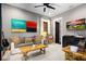 Stylish living room with unique decor, comfortable seating, and a relaxing atmosphere at 1015 Tallacoe Trl, New Smyrna Beach, FL 32168