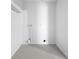 Unfinished storage space with tile floors and stubbed out plumbing at 1054 Abeline Dr, Deltona, FL 32725