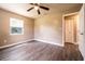 Bedroom featuring ceiling fan, neutral wall color and closet at 1160 Fountainhead Dr, Deltona, FL 32725