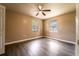 Bedroom with two windows, ceiling fan and neutral wall color at 1160 Fountainhead Dr, Deltona, FL 32725