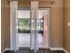 Screened-in patio with view to the backyard at 1160 Fountainhead Dr, Deltona, FL 32725