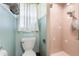 Cozy bathroom with shower and toilet, enhanced by classic design and natural light at 1206 Parkside Dr, Ormond Beach, FL 32174