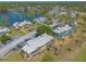 Overhead view of a waterfront condominium complex boasting serene lake views and well-maintained grounds at 124 Golden Eye Dr # A, Daytona Beach, FL 32119