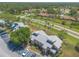 Aerial shot showcasing lush landscaping and ample parking spaces surrounding the well-maintained property at 124 Golden Eye Dr # A, Daytona Beach, FL 32119
