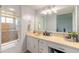 Well-lit bathroom featuring a vanity and a spacious shower with glass door at 124 Golden Eye Dr # A, Daytona Beach, FL 32119
