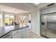 Spacious kitchen featuring modern appliances, ample countertop space, and an adjacent dining area at 124 Golden Eye Dr # A, Daytona Beach, FL 32119