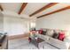 Spacious living room with a large couch, featuring a modern decor and hardwood floors at 124 Golden Eye Dr # A, Daytona Beach, FL 32119