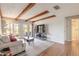 Bright living room featuring wood beams, lots of natural light and hardwood floors at 124 Golden Eye Dr # A, Daytona Beach, FL 32119