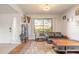 Charming living room with a cozy sofa, stylish decor, and bright natural light at 124 Golden Eye Dr # A, Daytona Beach, FL 32119