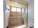 Modern walk-in shower with glass door, tiled walls, and multiple shower heads at 124 Golden Eye Dr # A, Daytona Beach, FL 32119