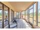 Cozy screened lanai, perfect for enjoying the outdoors with comfortable seating and a scenic view at 124 Golden Eye Dr # A, Daytona Beach, FL 32119