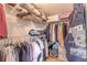 Organized walk-in closet with shelving and clothing racks, offering ample storage space at 124 Golden Eye Dr # A, Daytona Beach, FL 32119