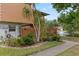 Exterior shot with lush landscaping, water views, and mature trees at 135 Moonstone Ct, Port Orange, FL 32129