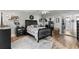 Nicely appointed main bedroom with mirrored closet doors and a ceiling fan at 135 Moonstone Ct, Port Orange, FL 32129