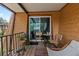 Comfortable outdoor patio with furniture, potted plants and view of exterior at 135 Moonstone Ct, Port Orange, FL 32129