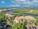An aerial view showcases this multi-Gathering home nestled among lush trees, with water views and parking at 1401 S Palmetto Ave # 300, Daytona Beach, FL 32114