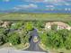 Panoramic aerial view of a beautiful condo community and pool situated near the waterfront at 1401 S Palmetto Ave # 300, Daytona Beach, FL 32114