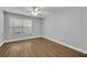 Bedroom featuring a window and wood floors at 1401 S Palmetto Ave # 300, Daytona Beach, FL 32114