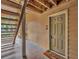 Condo building entrance featuring staircase leading to upper units and unit door at 1401 S Palmetto Ave # 300, Daytona Beach, FL 32114