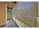 Relaxing outdoor patio featuring bamboo shades for privacy and shade from the sun at 1401 S Palmetto Ave # 300, Daytona Beach, FL 32114