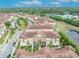 Aerial view highlighting the community's layout near the lake and surrounding greenery at 1436 Lobelia Dr, Lake Mary, FL 32746