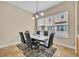 Dining area featuring tile flooring and a modern table and chairs with a window view at 1436 Lobelia Dr, Lake Mary, FL 32746