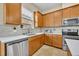 Kitchen area featuring stainless appliances, light countertops, and plenty of cabinetry at 1436 Lobelia Dr, Lake Mary, FL 32746