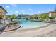 Community pool offers resort-style amenities, palm trees, and a welcoming atmosphere for relaxation at 1436 Lobelia Dr, Lake Mary, FL 32746