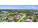 Enjoy the views of your neighborhood in this aerial view of the home near the lake at 1439 Waterview Dr, Deltona, FL 32738