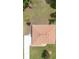 Aerial view of the home showcasing its well-maintained roof, manicured landscaping, and driveway at 1439 Waterview Dr, Deltona, FL 32738