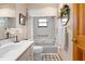 Well-lit bathroom boasts a bath tub and coordinated fixtures at 1439 Waterview Dr, Deltona, FL 32738