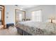 Relaxing bedroom features plenty of sunlight and tile flooring at 1439 Waterview Dr, Deltona, FL 32738