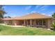 Charming single-story brick home boasting a lush green lawn and a well-maintained landscape at 1439 Waterview Dr, Deltona, FL 32738
