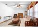 Bright living room with tile floors, ceiling fan, and comfortable seating arrangement at 1439 Waterview Dr, Deltona, FL 32738