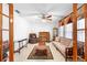 Cozy living room featuring tile floors, a ceiling fan, and ample natural light at 1439 Waterview Dr, Deltona, FL 32738
