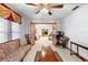 Spacious living area with tile floors, decorative furnishings, and open doorways at 1439 Waterview Dr, Deltona, FL 32738