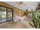 Relax on your covered brick patio that has a ceiling fan and bar for your outdoor parties at 1439 Waterview Dr, Deltona, FL 32738