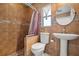 Bathroom features tile floors, a sink, and a shower at 1440 Portola Ave, Deltona, FL 32738