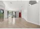 Bright entryway with tile flooring, high ceilings, and a clear view of the home's interior at 1440 Portola Ave, Deltona, FL 32738