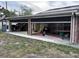 Exterior patio view, showing the lawn and home's open outdoor living space at 1440 Portola Ave, Deltona, FL 32738
