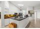 Bright kitchen featuring granite countertops, stainless steel appliances, and an island at 1440 Portola Ave, Deltona, FL 32738